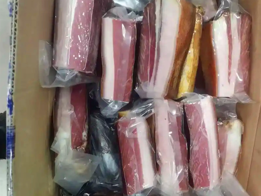 风干后打包好准备发往澳洲的腊肉